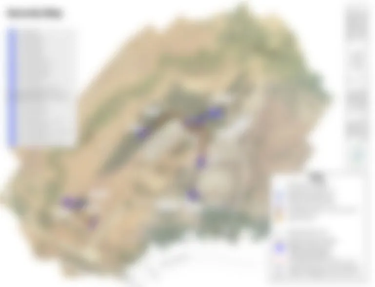 Heavily blurred security map of a rural property, showing only a vague outline of the site with coloured markers and a legend, all unreadable.